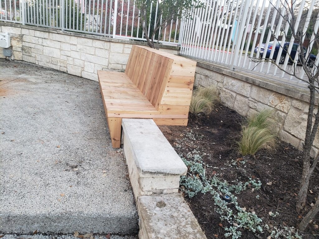 Cedar bench and planter work on a stone patio